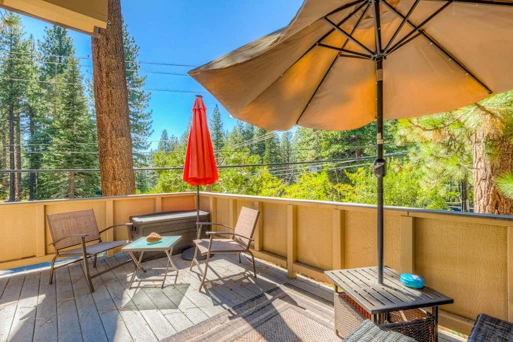 Two-story mountain-view condo with balcony, fireplace & pool - dog-friendly