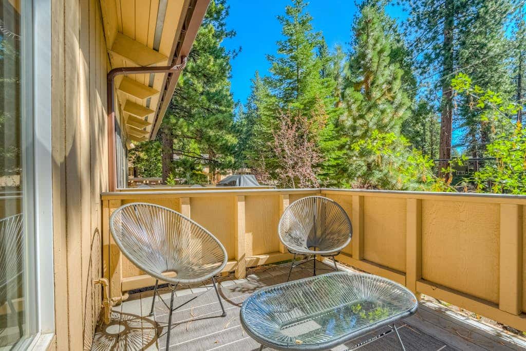 Two-story mountain-view condo with balcony, fireplace & pool - dog-friendly