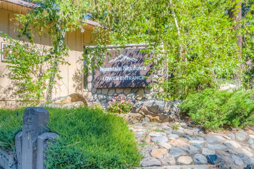 Two-story mountain-view condo with balcony, fireplace & pool - dog-friendly