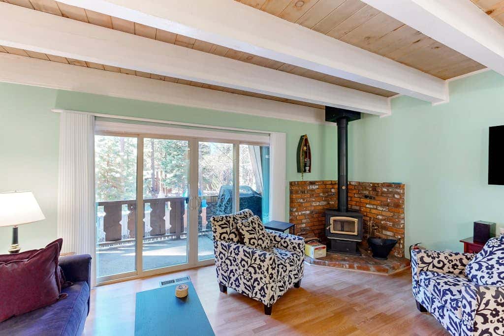 Forest-view condo with wood fireplace & walkable locale - dog-friendly