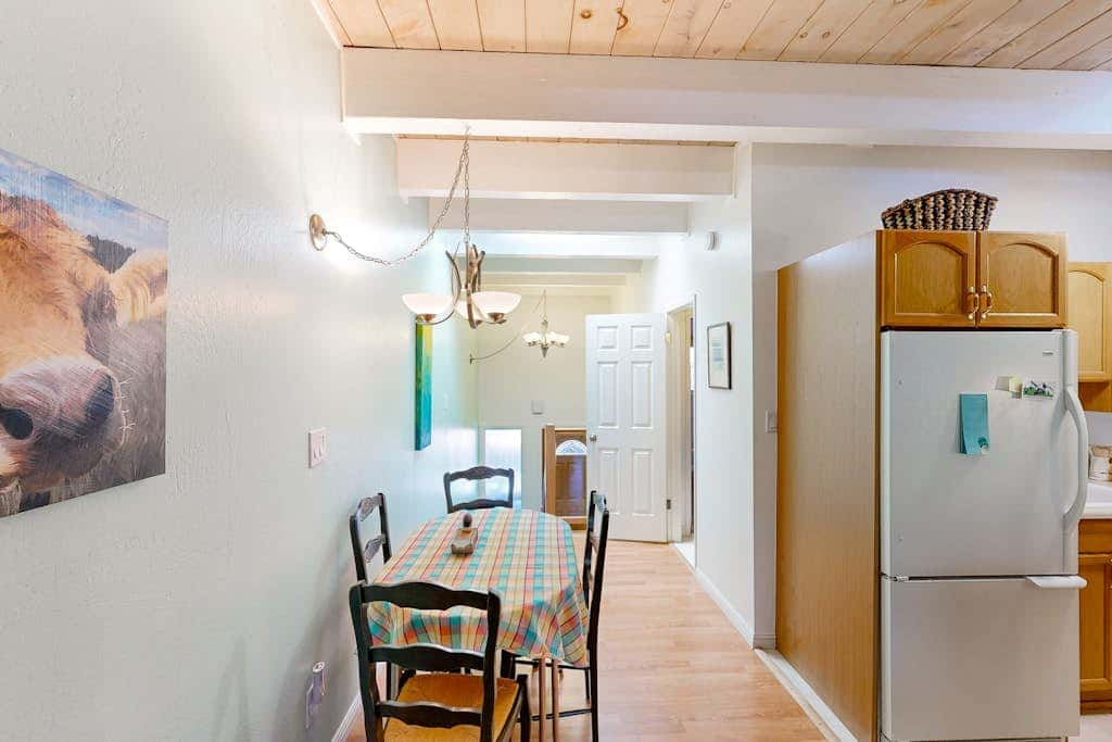 Forest-view condo with wood fireplace & walkable locale - dog-friendly