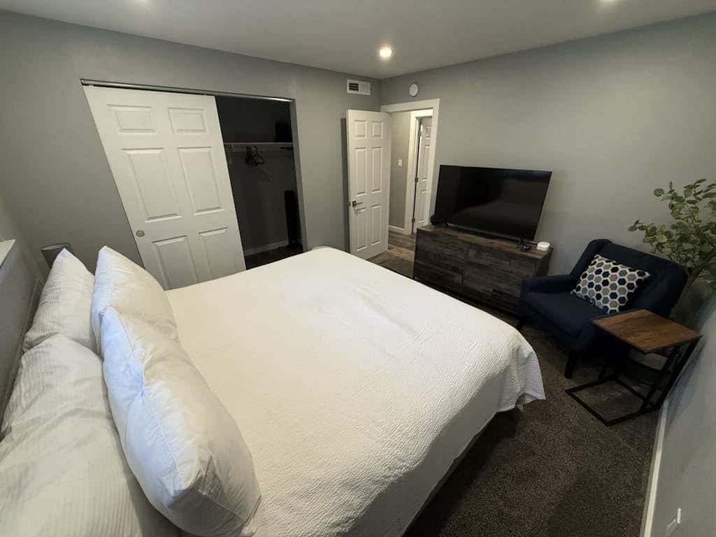 Forest-view condo with wood fireplace & walkable locale - dog-friendly