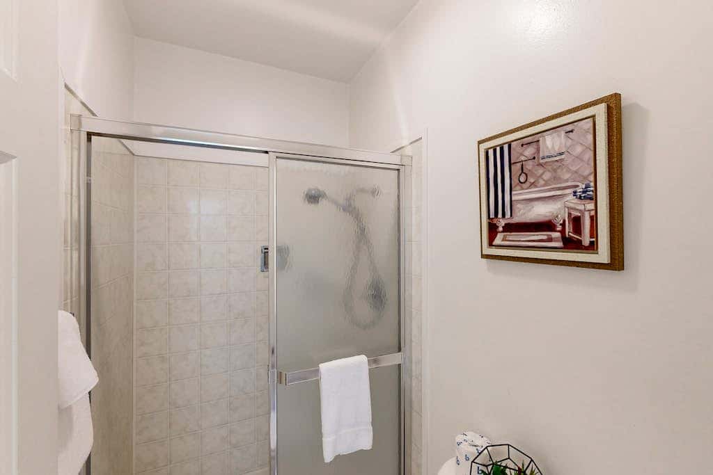 Forest-view condo with wood fireplace & walkable locale - dog-friendly