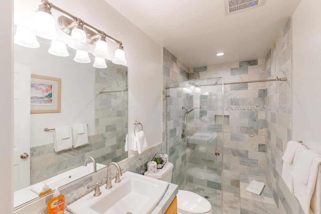Forest-view condo with wood fireplace & walkable locale - dog-friendly