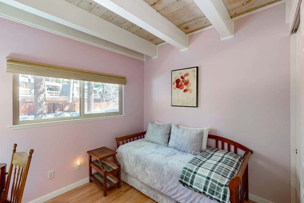 Forest-view condo with wood fireplace & walkable locale - dog-friendly