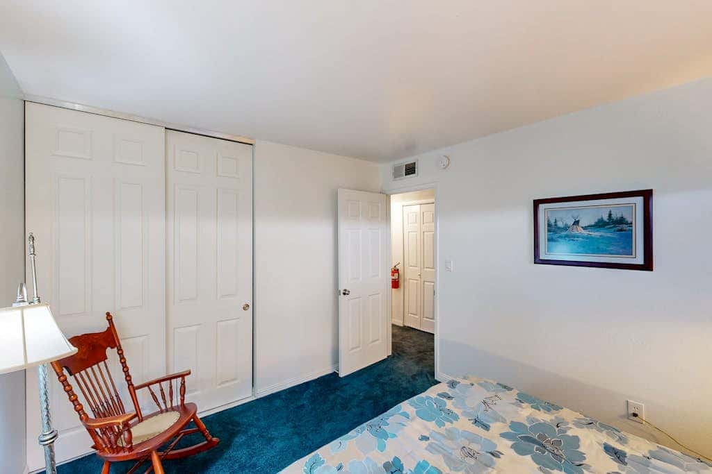 Forest-view condo with wood fireplace & walkable locale - dog-friendly