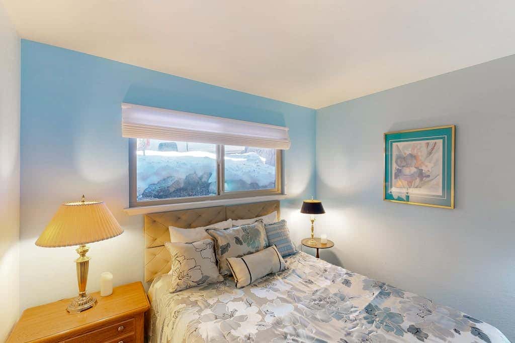 Forest-view condo with wood fireplace & walkable locale - dog-friendly