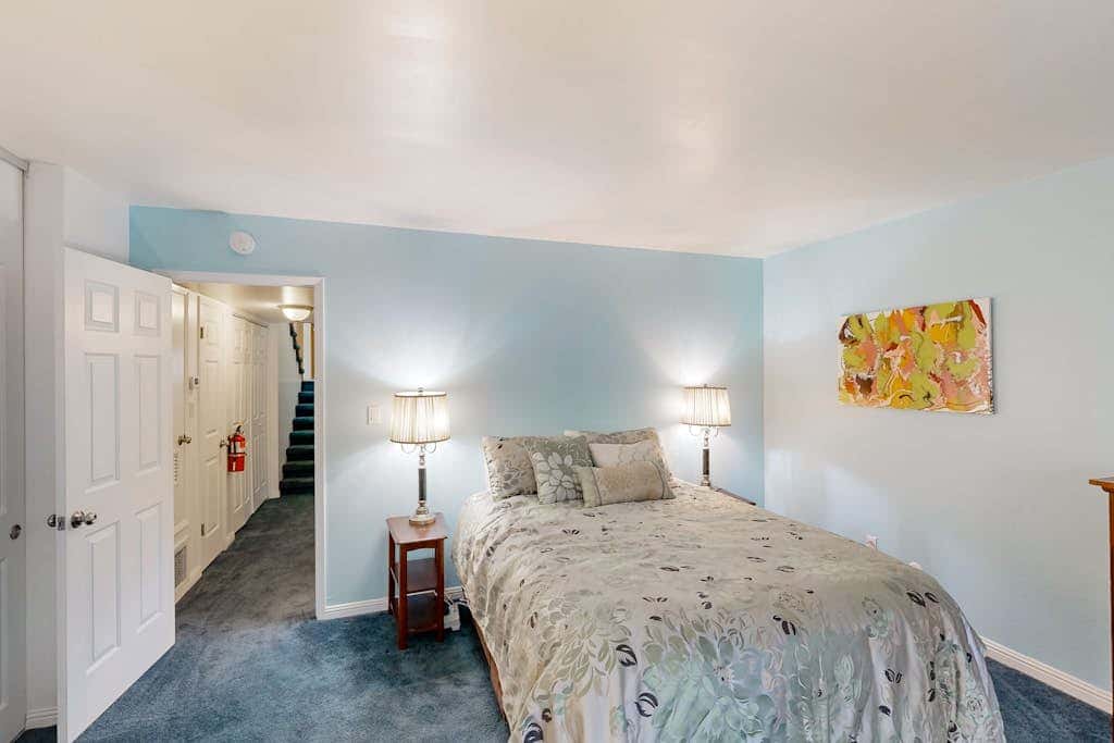Forest-view condo with wood fireplace & walkable locale - dog-friendly