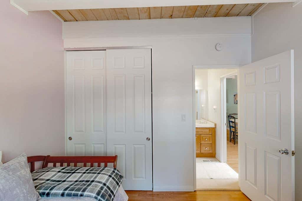 Forest-view condo with wood fireplace & walkable locale - dog-friendly