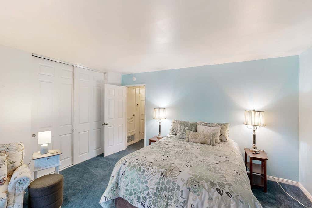 Forest-view condo with wood fireplace & walkable locale - dog-friendly