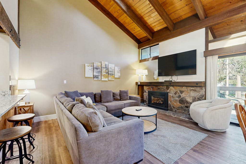 Outdoor adventure abounds at this 3-story resort home with a private beach