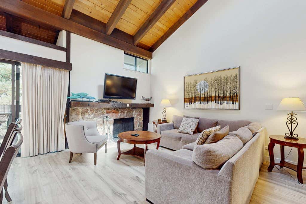 Let reality drift away with the lake view at this townhome with a private beach
