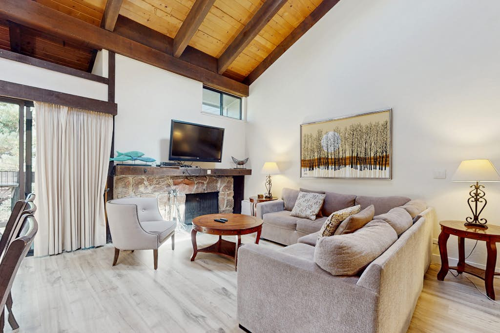 Let reality drift away with the lake view at this townhome with a private beach