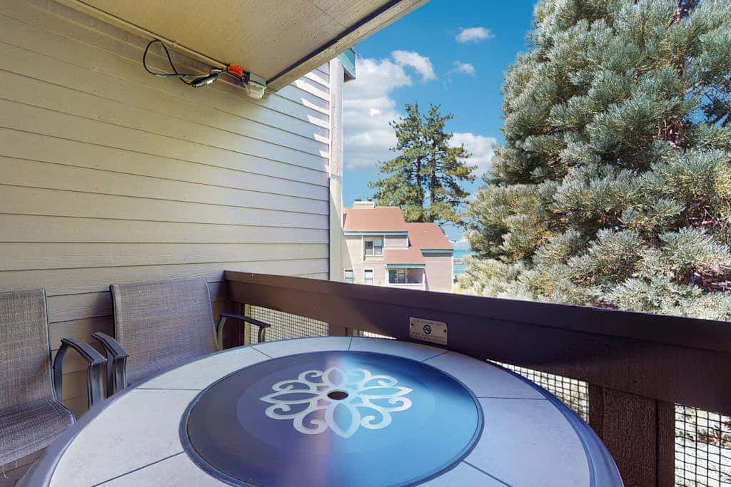 Let reality drift away with the lake view at this townhome with a private beach