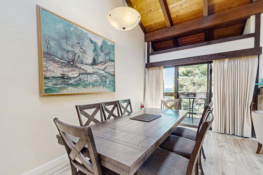 Let reality drift away with the lake view at this townhome with a private beach