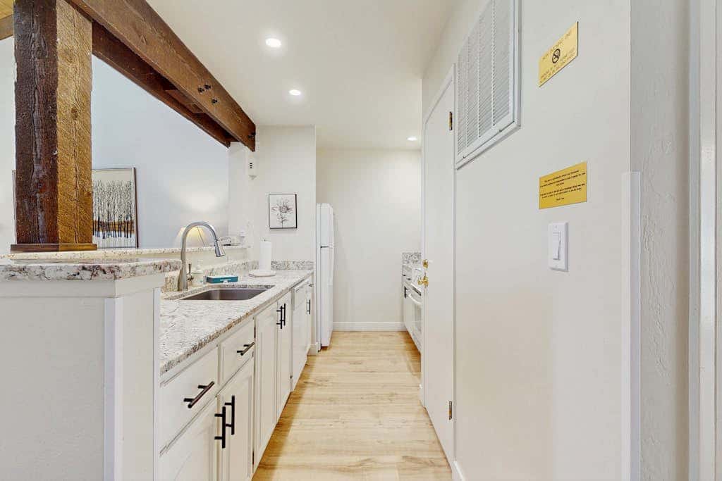 Let reality drift away with the lake view at this townhome with a private beach