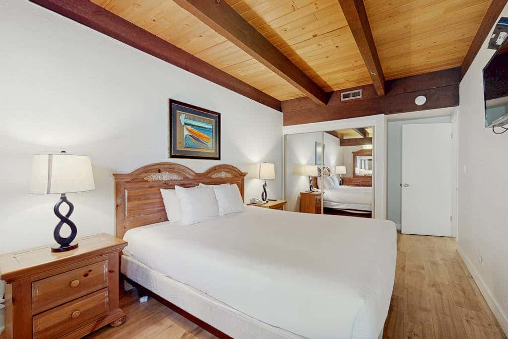 Let reality drift away with the lake view at this townhome with a private beach