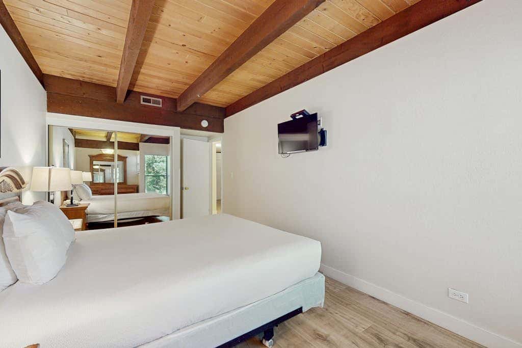 Let reality drift away with the lake view at this townhome with a private beach