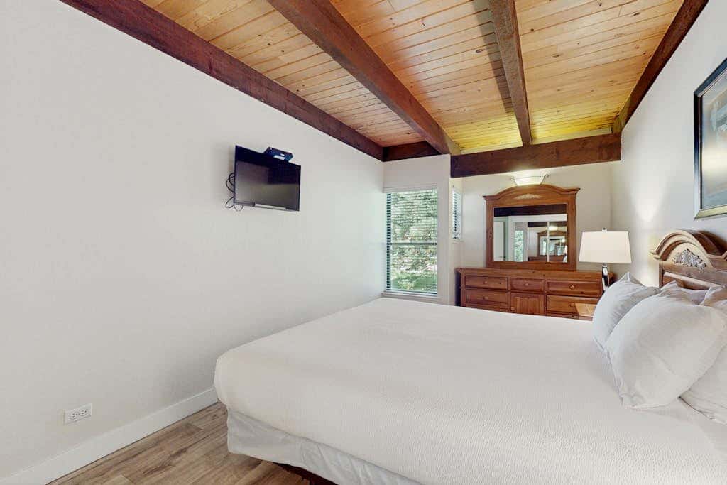 Let reality drift away with the lake view at this townhome with a private beach