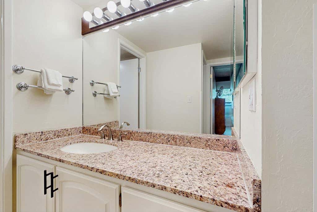 Let reality drift away with the lake view at this townhome with a private beach