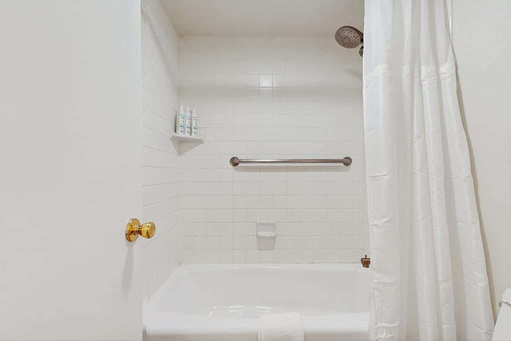 Let reality drift away with the lake view at this townhome with a private beach
