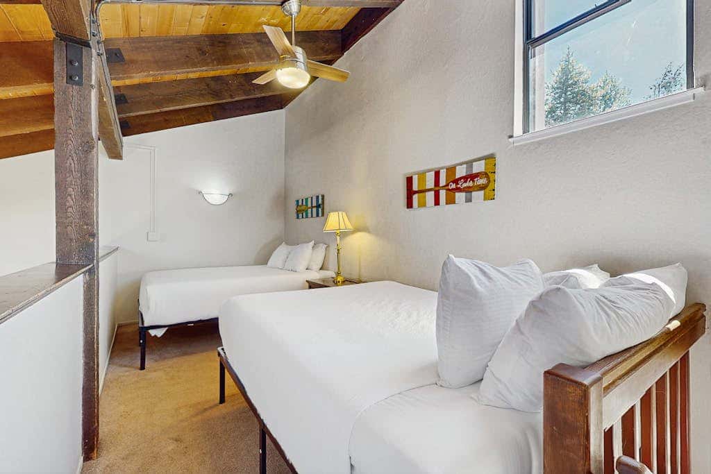 Let reality drift away with the lake view at this townhome with a private beach