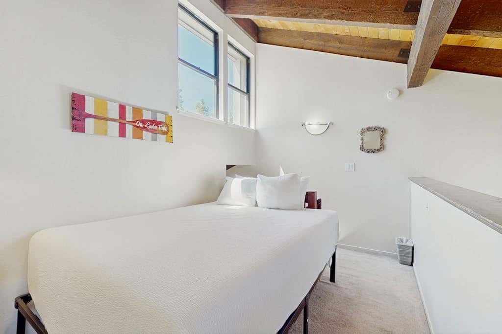 Let reality drift away with the lake view at this townhome with a private beach