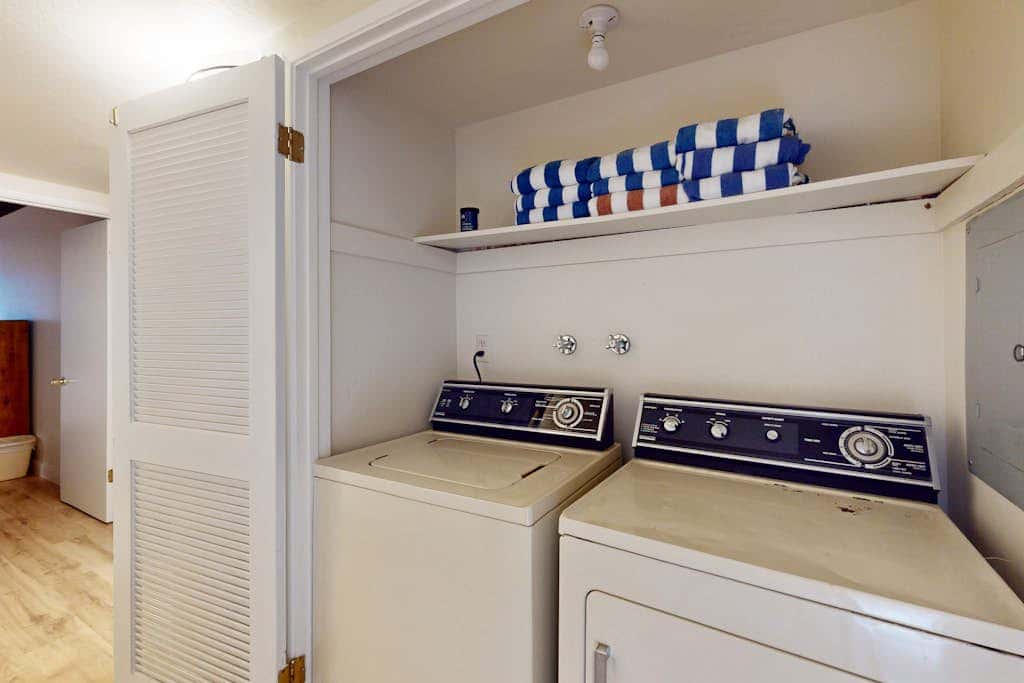 Let reality drift away with the lake view at this townhome with a private beach