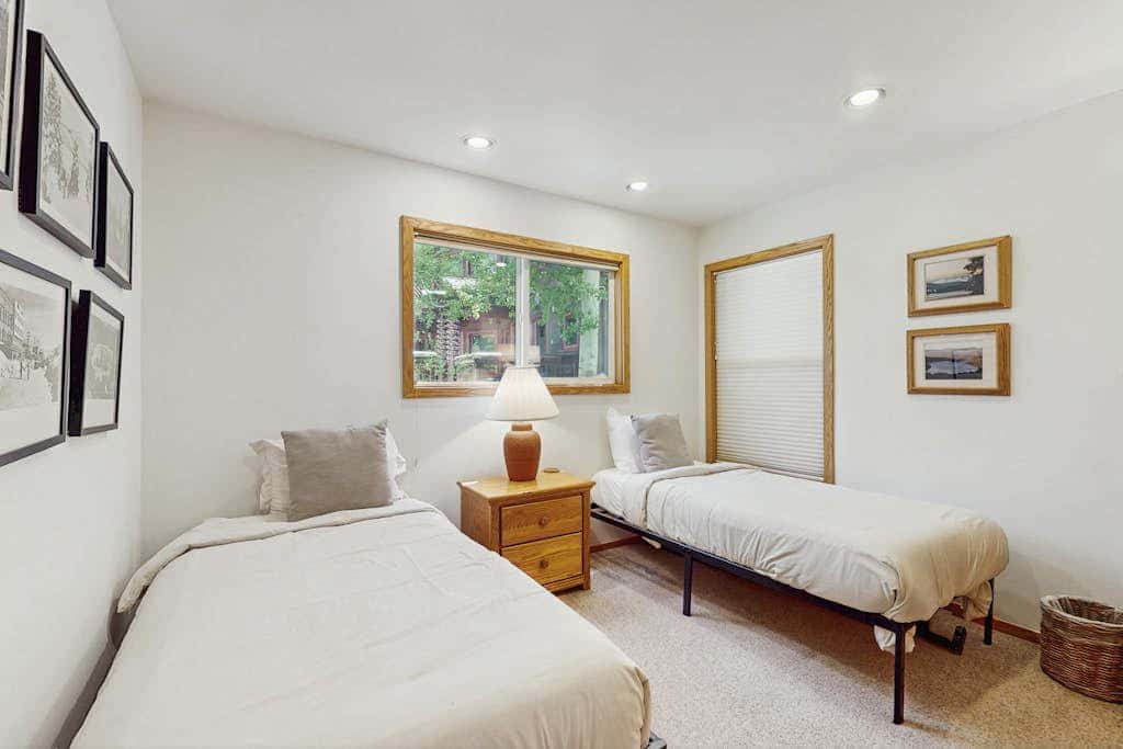 Terrific lakefront gem with private hot tub, dock & beach - near skiing & town