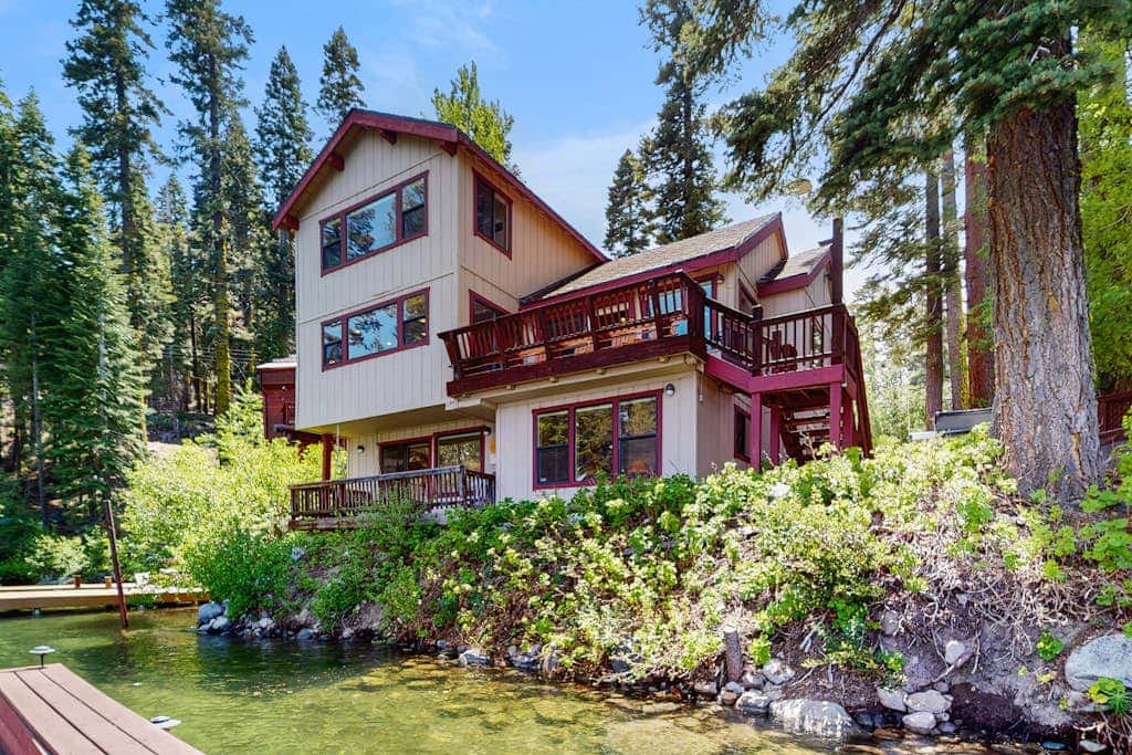 Terrific lakefront gem with private hot tub, dock & beach - near skiing & town