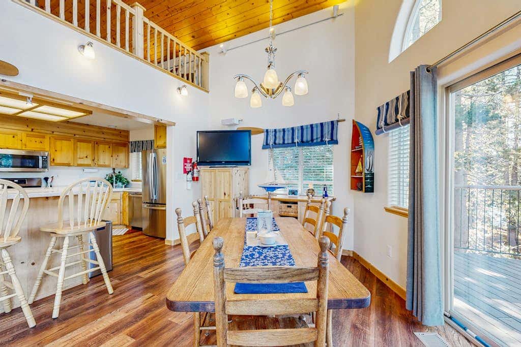 Family-friendly, lakefront getaway with a gas fireplace, furnished deck, & views