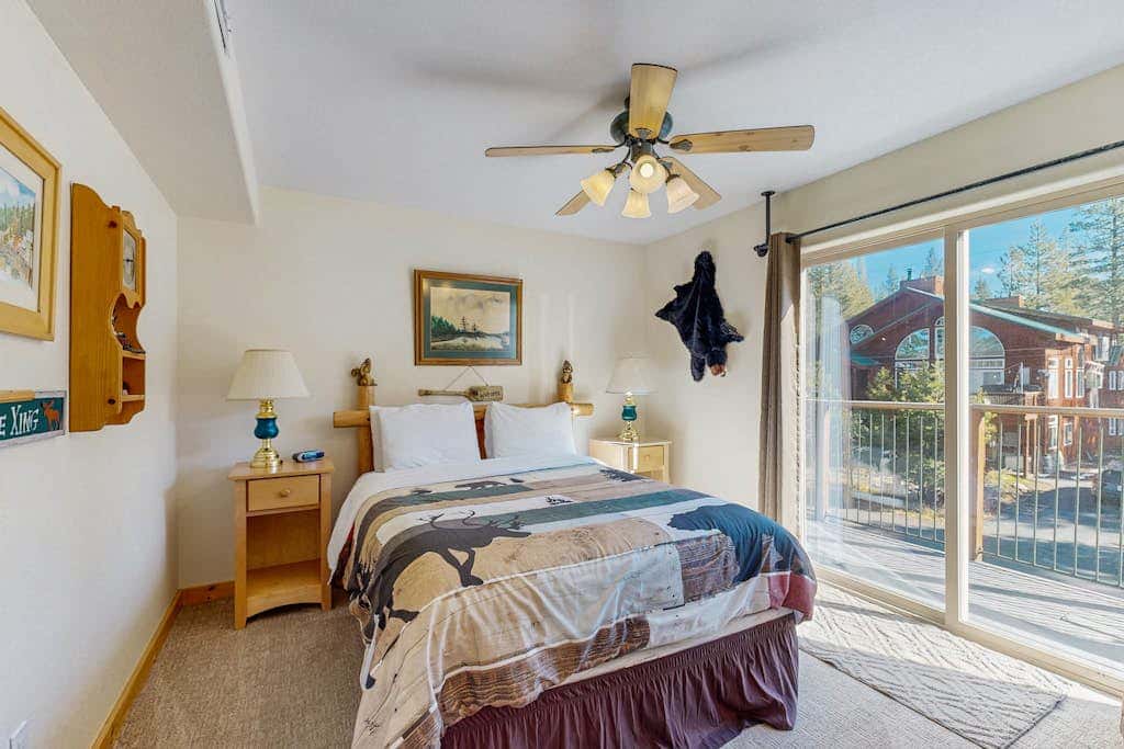 Family-friendly, lakefront getaway with a gas fireplace, furnished deck, & views