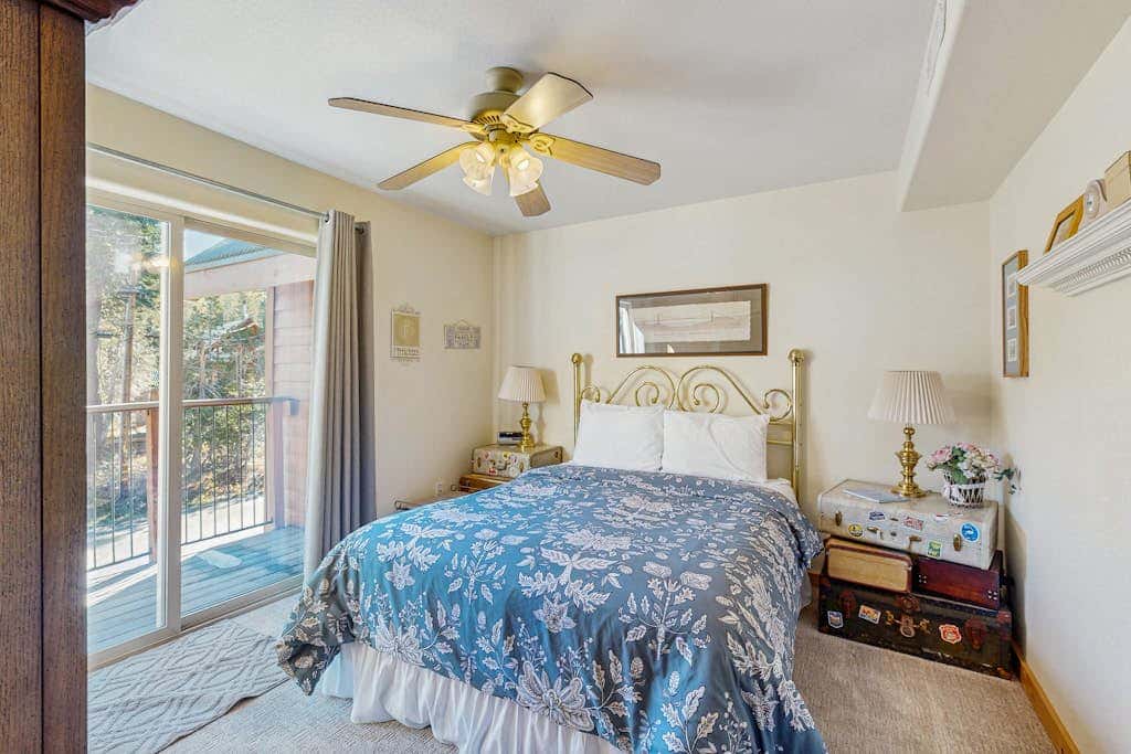 Family-friendly, lakefront getaway with a gas fireplace, furnished deck, & views