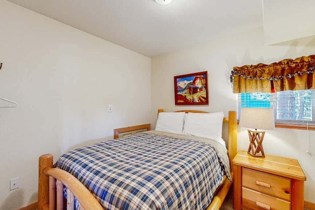 Family-friendly, lakefront getaway with a gas fireplace, furnished deck, & views