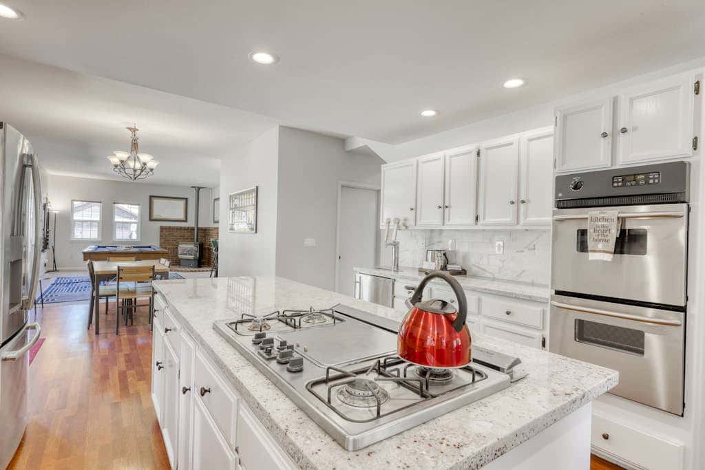 Dog-friendly home with pool table, fireplaces, & private hot tub, sleeps 10