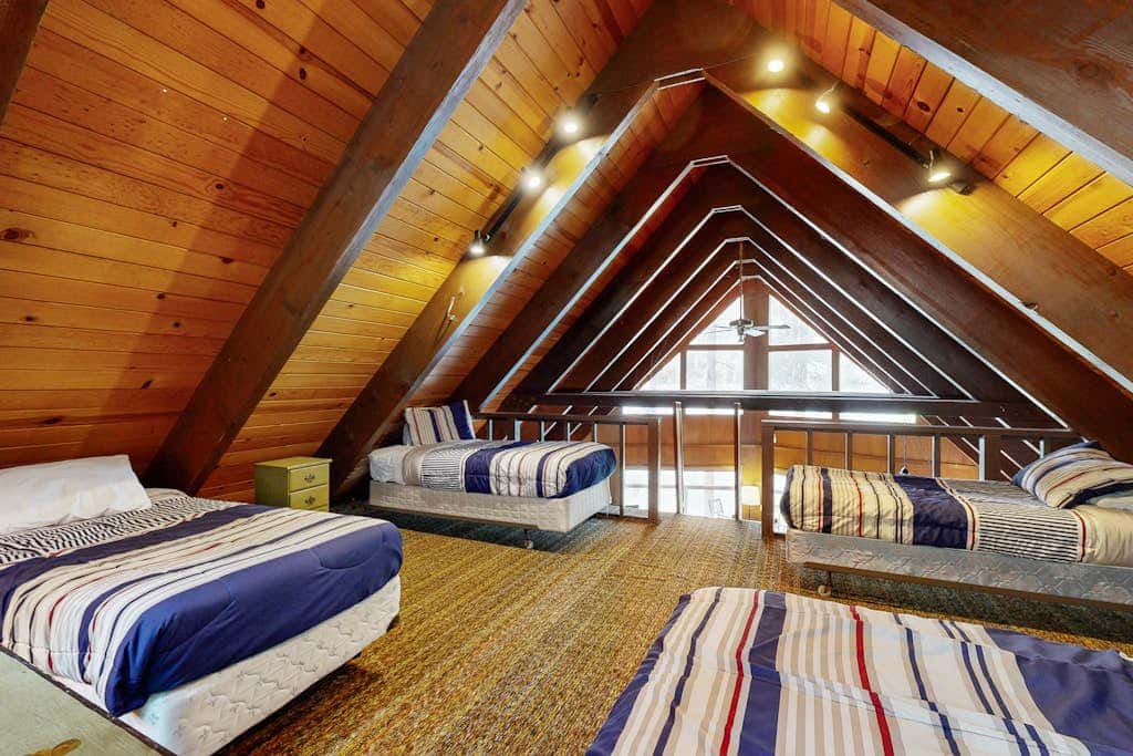 Superb lakefront home with mountain & lake views, fireplace, tennis & washer&dryer