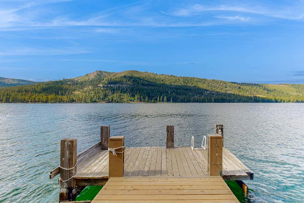 Superb lakefront home with mountain & lake views, fireplace, tennis & washer&dryer