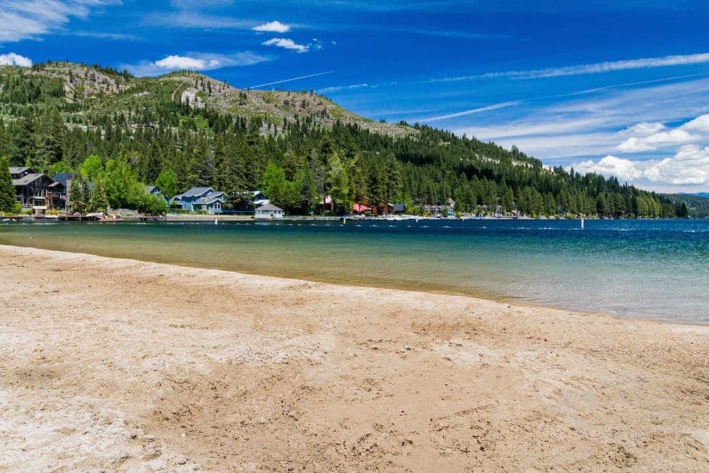 Superb lakefront home with mountain & lake views, fireplace, tennis & washer&dryer