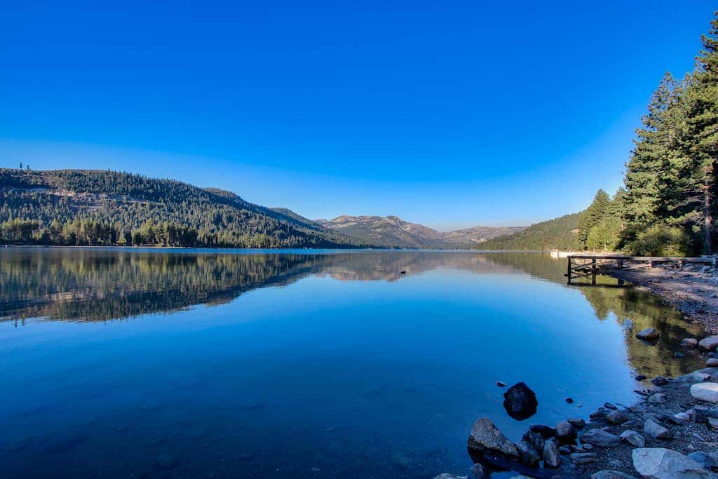 Superb lakefront home with mountain & lake views, fireplace, tennis & washer&dryer