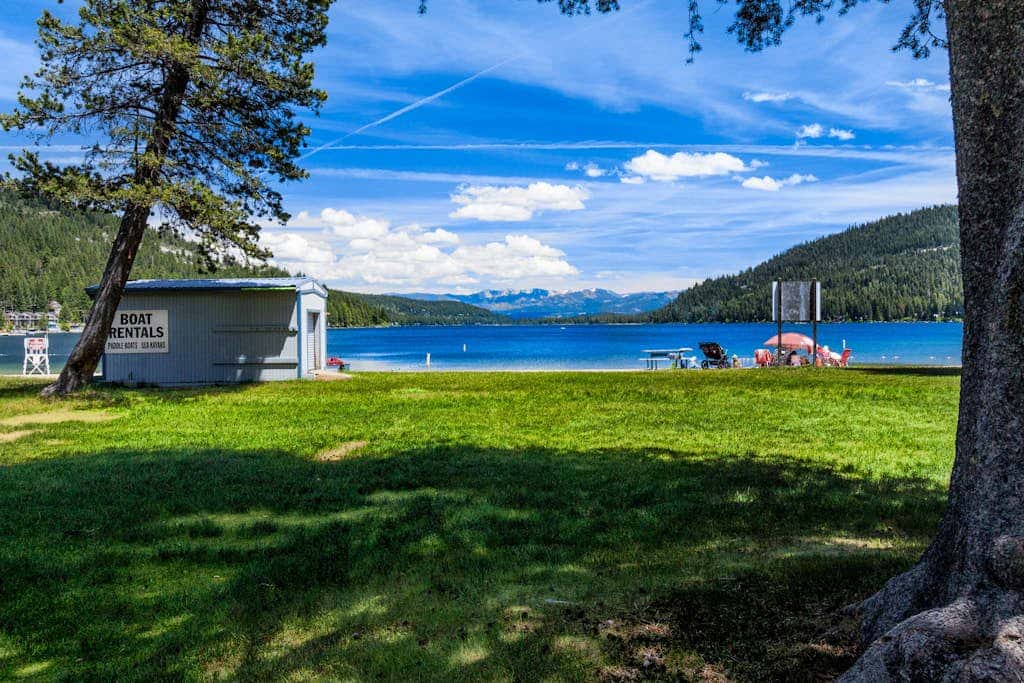 Superb lakefront home with mountain & lake views, fireplace, tennis & washer&dryer