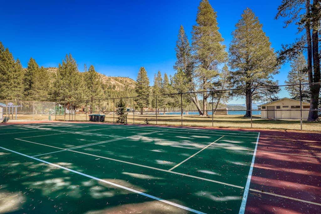 Superb lakefront home with mountain & lake views, fireplace, tennis & washer&dryer