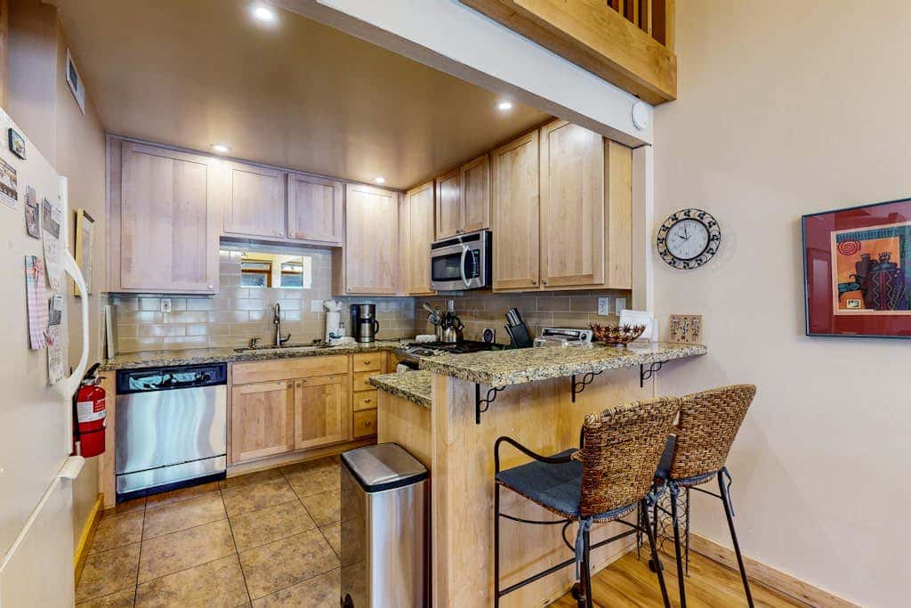 Second-floor lakefront condo with scenic views & easy access to town & slopes