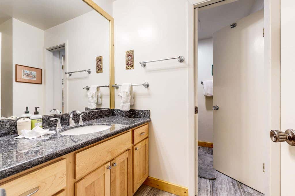 Second-floor lakefront condo with scenic views & easy access to town & slopes