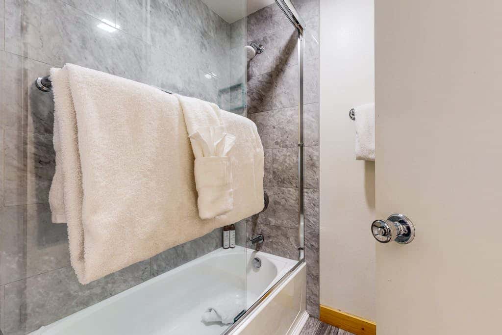 Second-floor lakefront condo with scenic views & easy access to town & slopes
