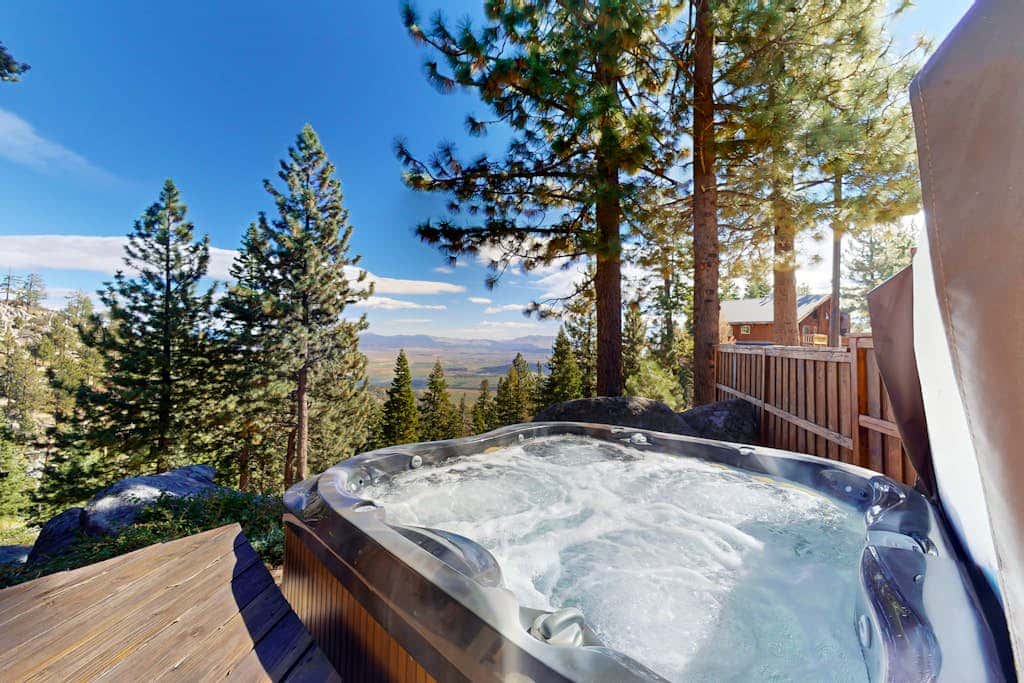 Dog-friendly mountain retreat with private hot tub, fireplace & views, sleeps 8