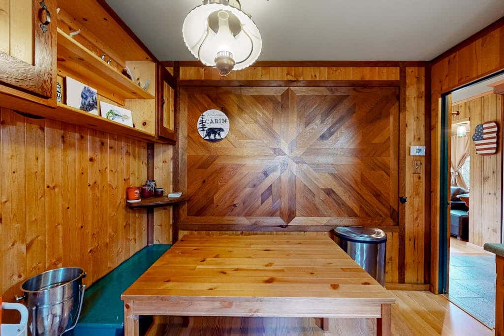 Riverfront dog-friendly retreat with a rustic flair & wood stove, near skiing