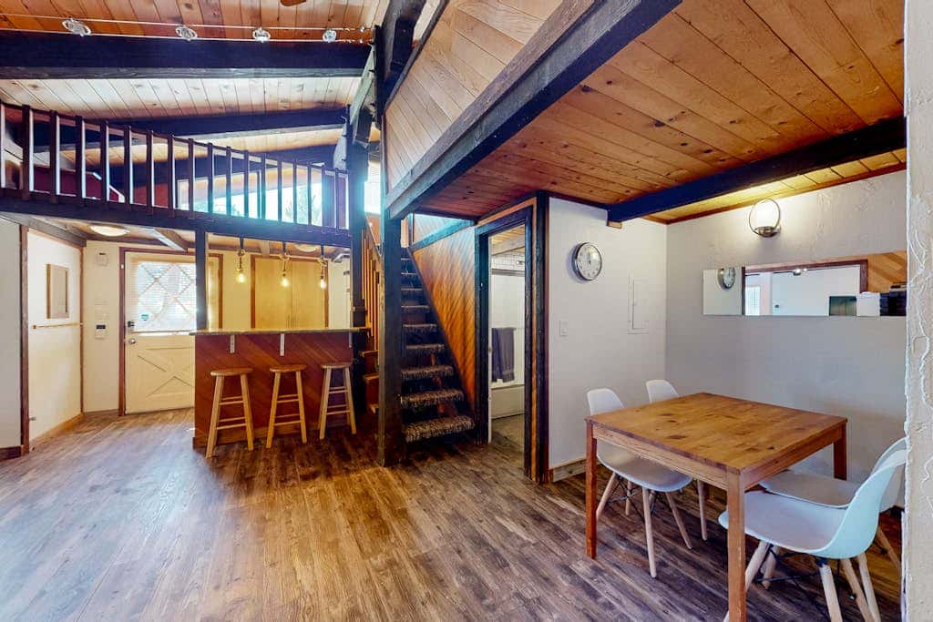 Dog-friendly nature escape with generous balcony, fireplace, & views, sleeps 6