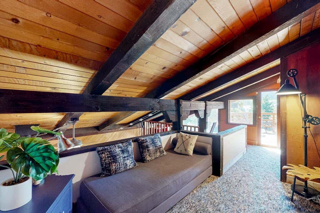 Dog-friendly nature escape with generous balcony, fireplace, & views, sleeps 6
