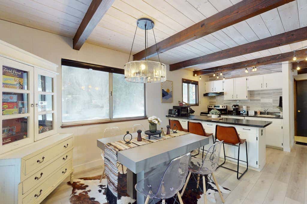 Family-friendly cabin with fireplace, bikes, loft, games, & skiing nearby