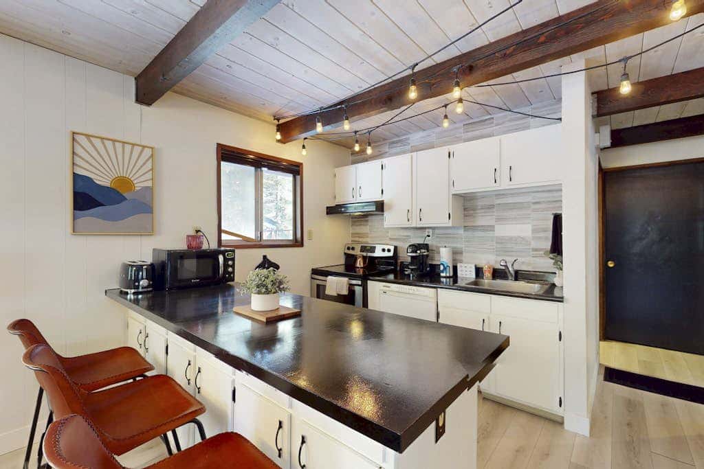 Family-friendly cabin with fireplace, bikes, loft, games, & skiing nearby